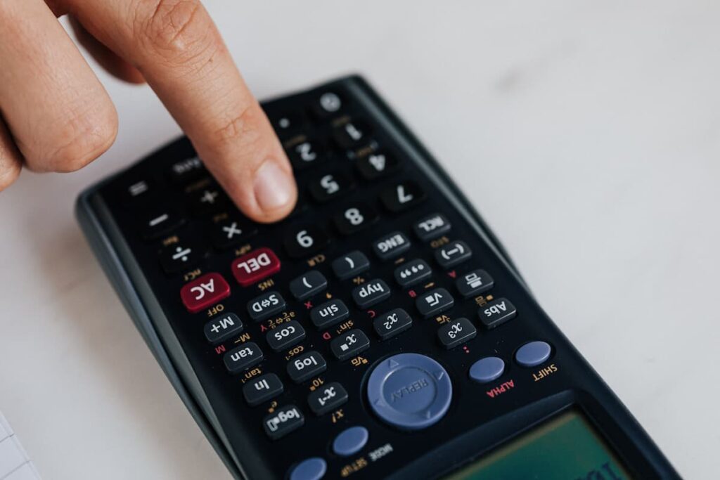 A person using a calculator.